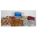 Group of vinyl tablecloths (all but one used), 2