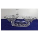 Fostoria glassware dishes, two trifooted