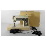 Singer touch and sew sewing machine with foot