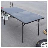 6ft Poly Folding Table, black in color, used