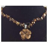20in South African tigers eye carved floral
