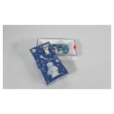 Paper guest towels in ceramic holder with winter