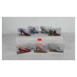 The Met miniature shoe ornaments in boxes, seven
