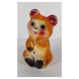 Chalkware teddy near bank, stands 11" tall, in