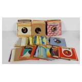 Large group of 45 rpm records in sleeves,
