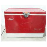 Coleman, red metal cooler with bottle openers on