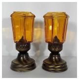 Oil lamp set with Amber colored glass globes.