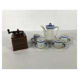 Espresso pot and four cups and saucers,