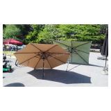 Two Outdoor Table Umbrellas. 8ft beige color but
