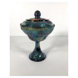 Blue Carnival glass compote with grape design,