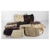 Eleven purses, cloth, leather and pleather, some