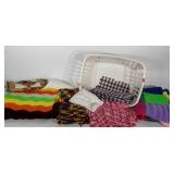Textile lot with laundry hamper: 3 afghans. Table