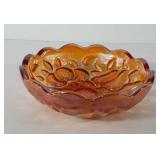 Marigold carnival glass bowl with fruit design,