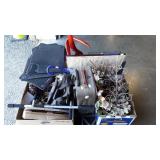 Skid lot, luggage, statue, ornament trees,