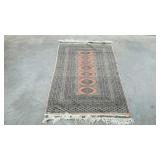 Scatter rug, 37 x 63, torn edges as shown