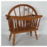 Solid wood magazine / media rack. Has water