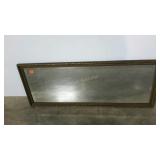 Older mirror. Carved frame, beveled glass.