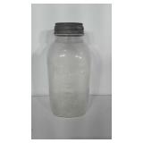 Half gallon Atlas Mason Jar with zinc lid.