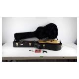 Fender acoustic guitar, model F-15, with leather