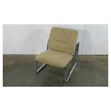 Steelcase lounge chair, neutral color, needs spot