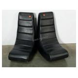 Two  vinyl gaming chairs. Will need wiped down.