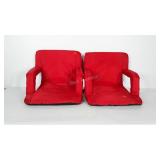 Two polyester bleacher seats made by Oniva. These