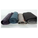 Four yoga / exercise mats. Styles and conditions