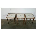 Three matching tile mosaic tables, copper