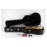 Fender acoustic guitar, model F-15, with leather