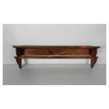 Wooden shelf measuring 42" long. Top measures