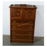 Statement piece. Double doors over four drawers