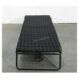 Coleman camp cot with pad, 80" x 30", small tear