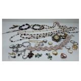 Assortment of costume jewelry, necklaces,