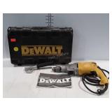 DeWalt 5/8" hammerdrill with case, powers on