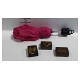 Pocket umbrella and three pins