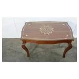 Accent table with inlay starburst  detail,  glass