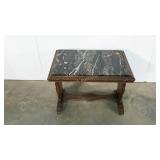 Marble top table, piece is split in two, carved