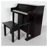 Vintage Ely Mello-Tone toy piano with stool.