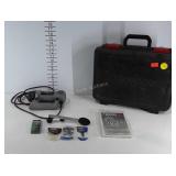 Rotozip spiral saw with bits, powers on