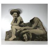 Large pressed paper board of two beer drinking