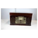Crosley CD player/ radio/ turntable, powers on,
