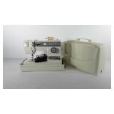 Singer sewing machine with case and foot pedal,