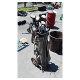Older Set of Golf clubs with portable bag