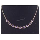 Simulated amethyst color diamond earrings and