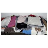 Ladies clothing group. Most are between sizes