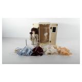 Porcelain doll with closet, stand, clothing,