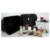 Storage tote with lid full of yarn. Also includes