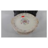 Basket with ten handled platters marked Royal