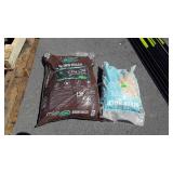 Landscaping, bag of River Rock, bag of Brown