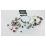 Two Sterling charm bracelets with charms